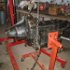 Following a design of a fellow Model T guy I made an adapter to allow the use of a standard engine stand on a T engine. The engine shown here upside down,  is mounted on the side rather then on the end as usual.